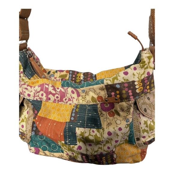 Fossil 2000's Y2K Slouchy Crossbody Bag
11.5" W, 11" H, 4.5" D patchwork - Picture 2 of 12